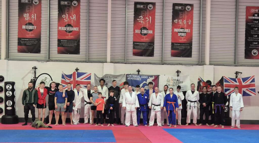 Universal Judo Academies Club photo including players from the Dog Pit, Shell Judo Club, and Foundation Martial Arts after a charity fundraiser for the Royal Marines charity on Remembrance Sunday